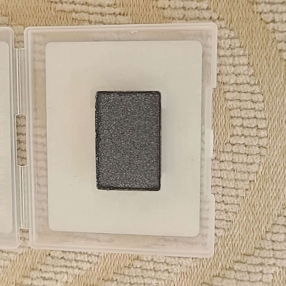 Mary Kay Brilliant Black eyeshadow.